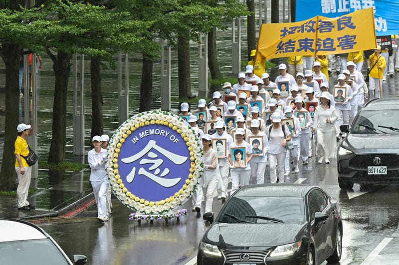風雨中前行 台北舉行反迫害26週年遊行