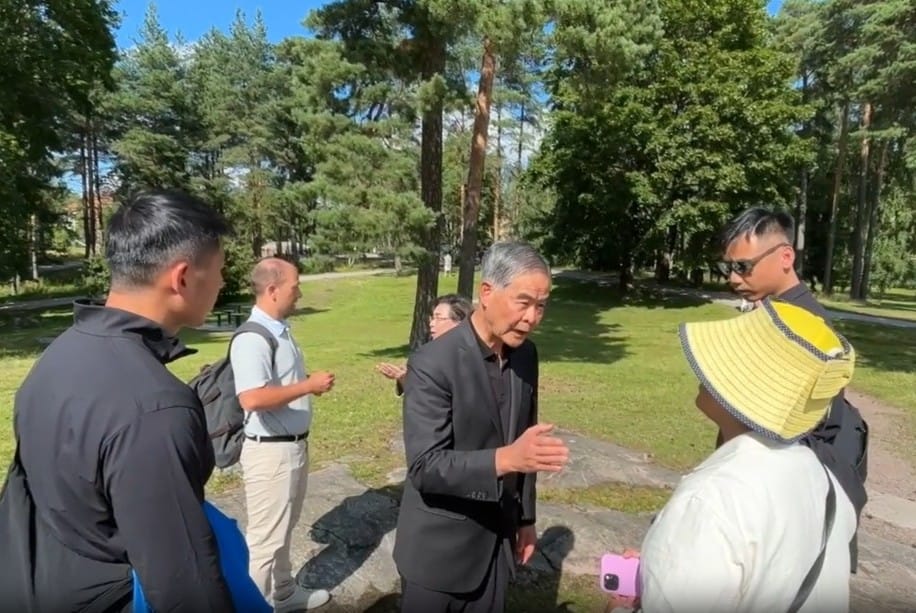 香港前特首梁振英在芬蘭威脅法輪功學員
